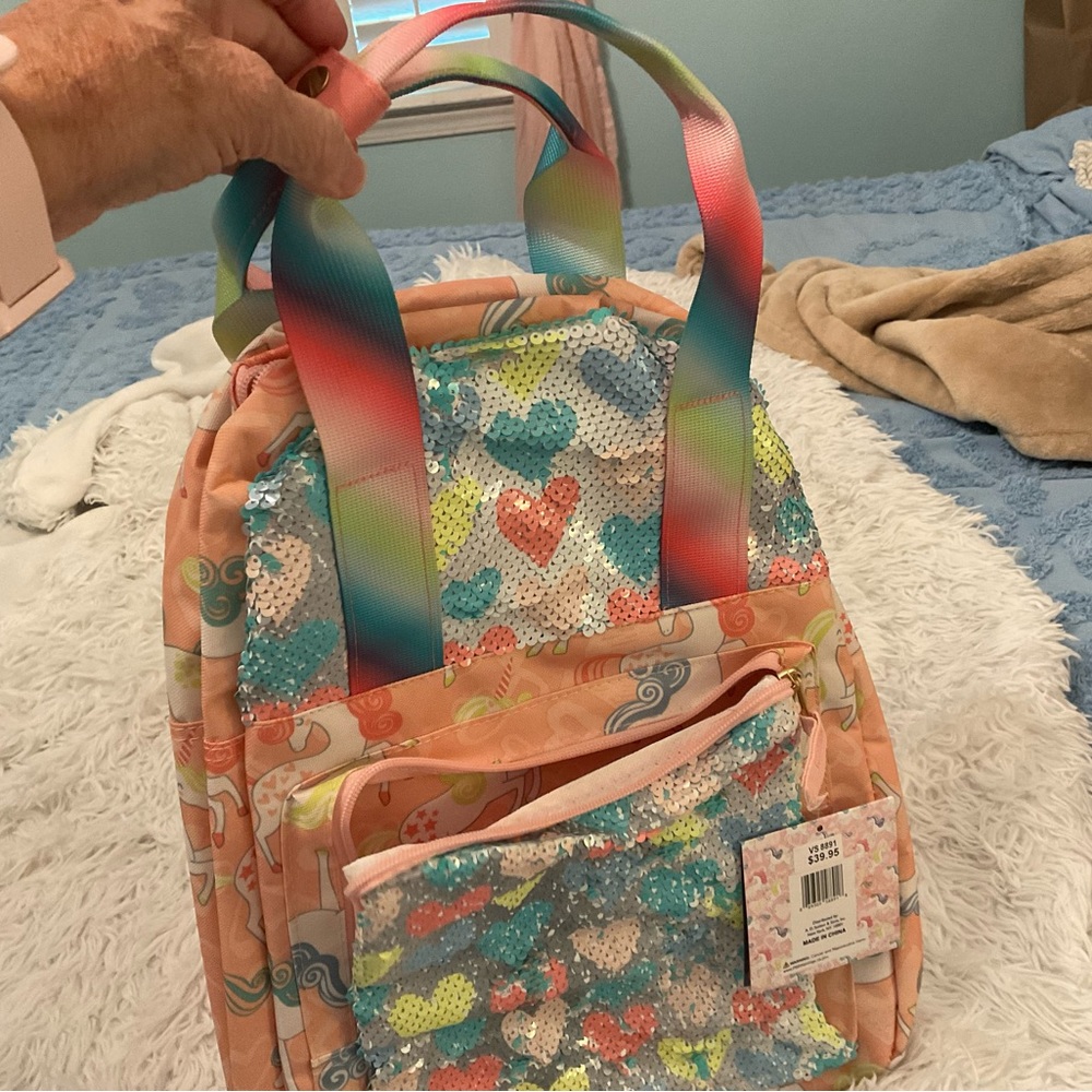 Pink book bag with sequins hearts